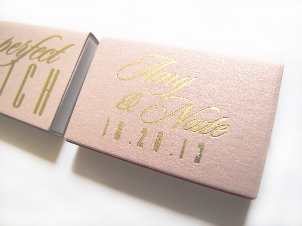 Personalized pink wedding matchboxes with gold foil text – custom wedding favors